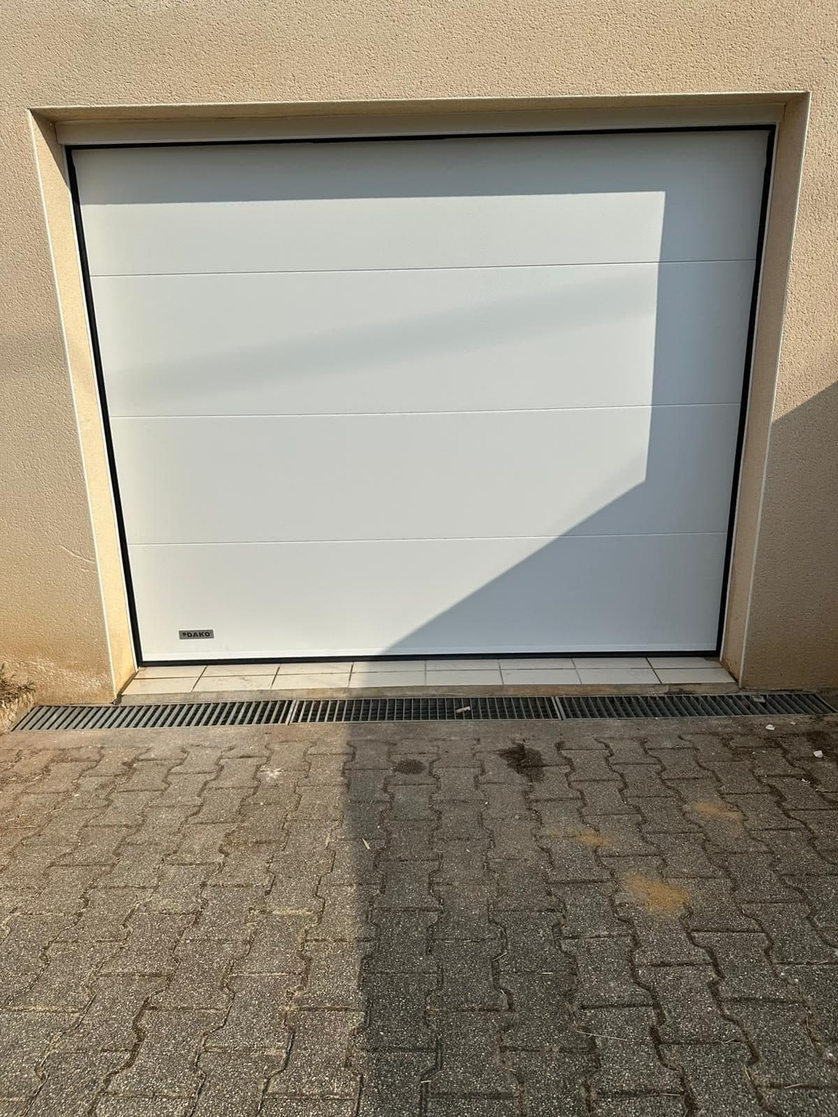Porte de garage battante à Decazeville