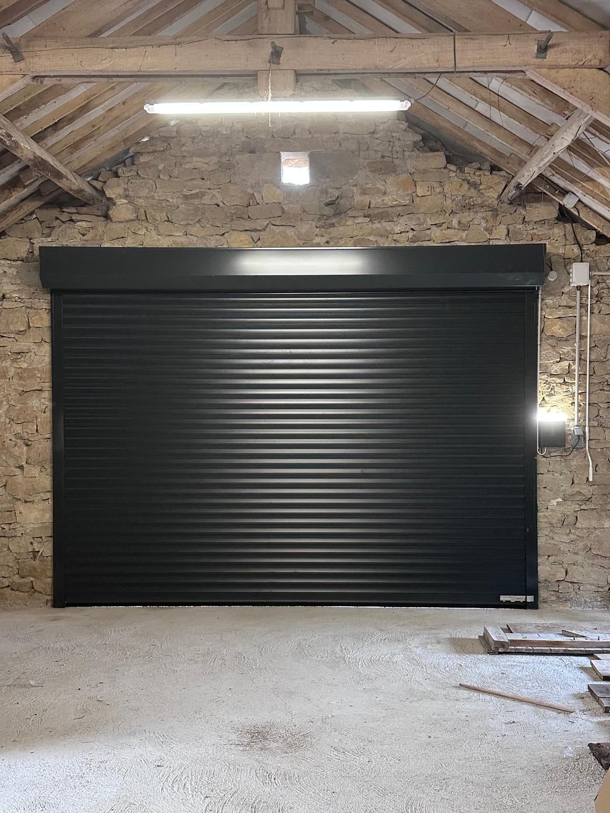 Porte de garage battante à Cajarc